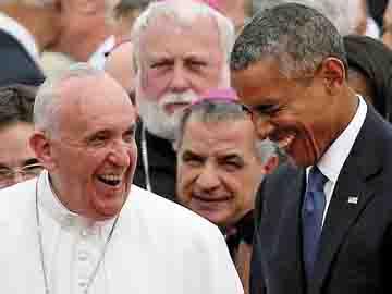 Pope, Obama wear their best smile