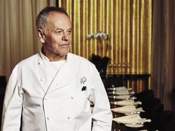 A cut above: Wolfgang Puck, king of California cuisine, finally opens a restaurant In New York