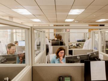 Temperature checks, desk shields: CDC suggests big changes to offices