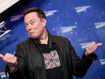 Deal to buy Twitter 'temporarily on hold': Elon Musk