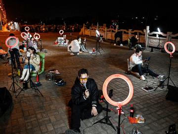 Chinese live streamers flock outdoors to get late-night donations from online 'passer-by'