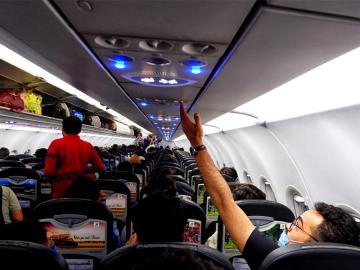 65 percent passengers paid extra to reserve a seat on the plane in the past year: Survey