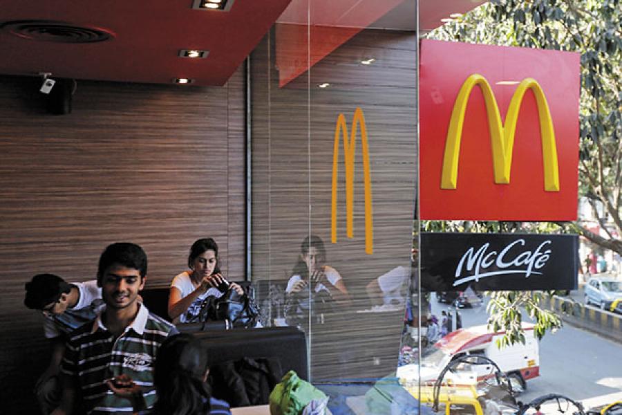 McDonald's tries to keep its head above water with cost cuts