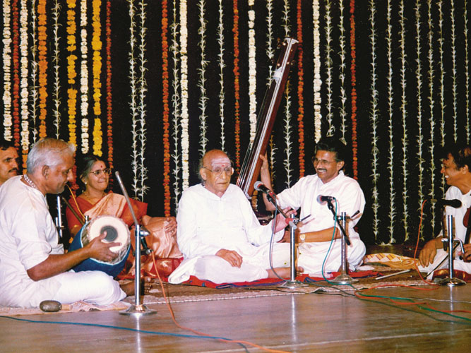 THE KUTCHERI BECKONS: The late Semmangudi Srinivasa Iyer giving a concert