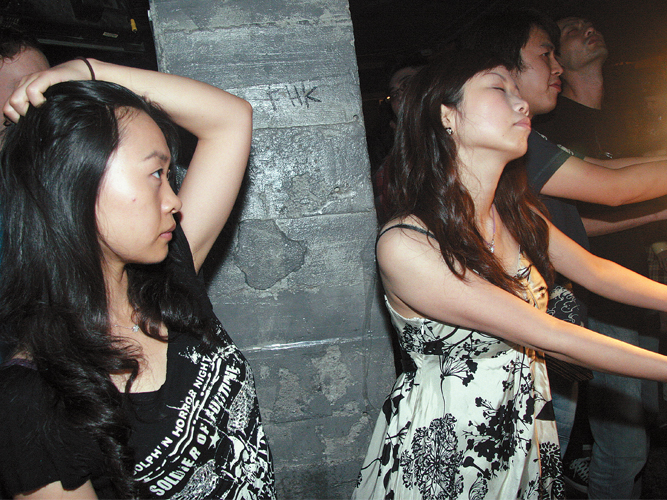 Alive and Kicking: Late night revellers at The Shelter, one of Shanghais underground bars