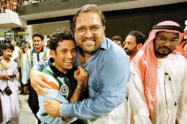 Mascarenhas with Tendulkar after the final match of the Coca-Cola Cup in Sharjah in 1998