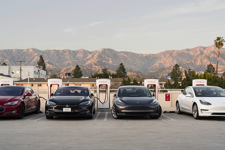 Tesla Model 3 sales surge, lifting its bottom line