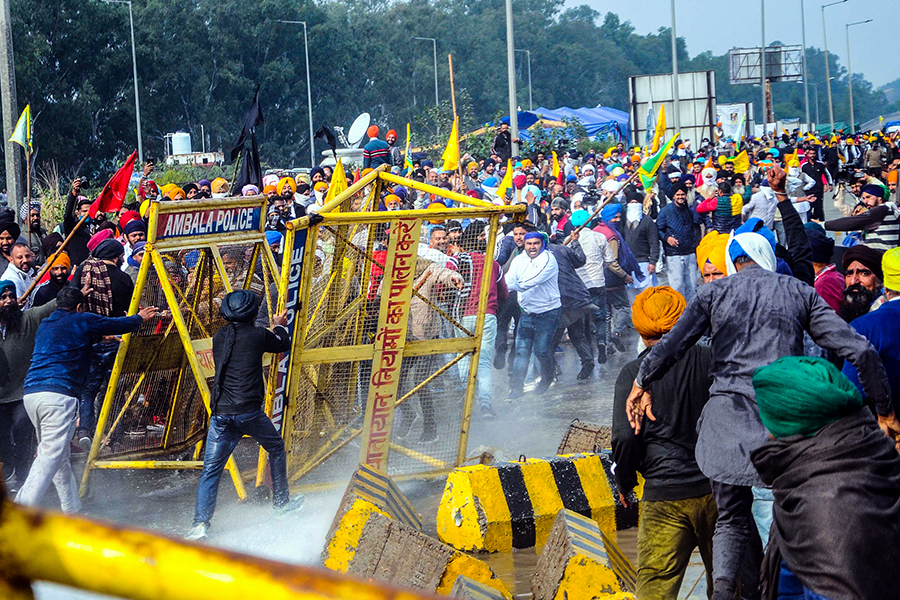 Photo of the Day: Farmers clash with police, water cannons fired