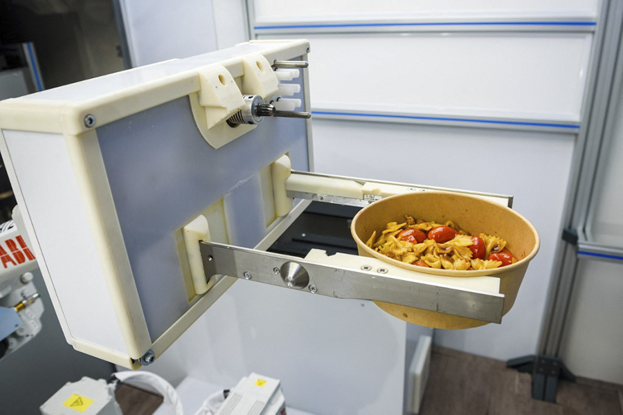Kitchen robot in Riga, Latvia cooks up new future for fast food