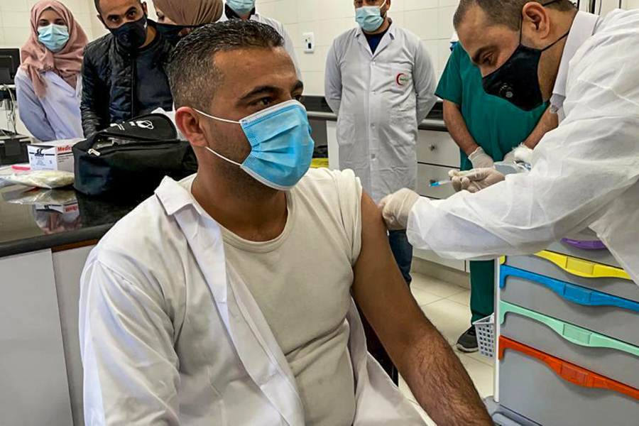 Israel's vaccine success unleashes a debate on Palestinian inequities