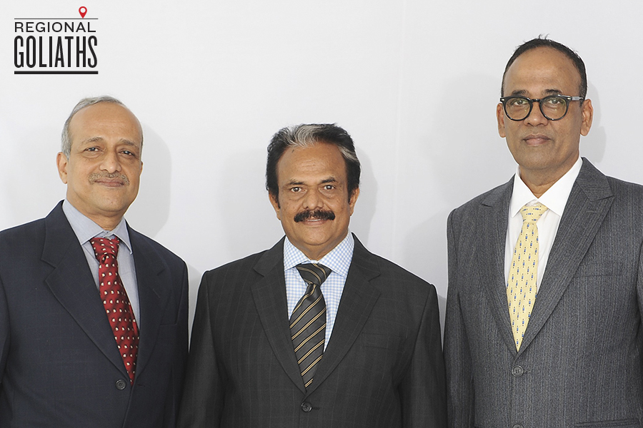 from left to right mr. p manjunath - director  mr. k madhavan - managing director  mr