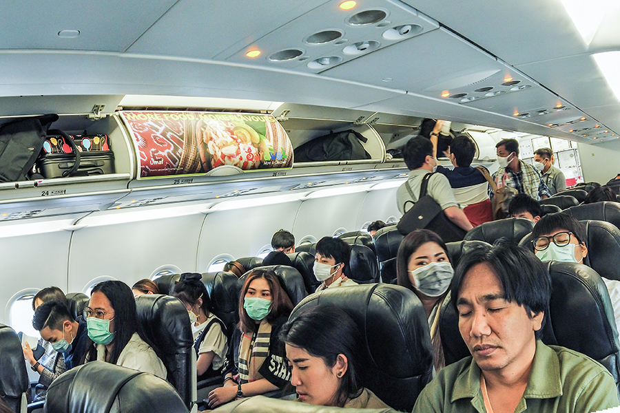 One 18-hour flight, four coronavirus infections