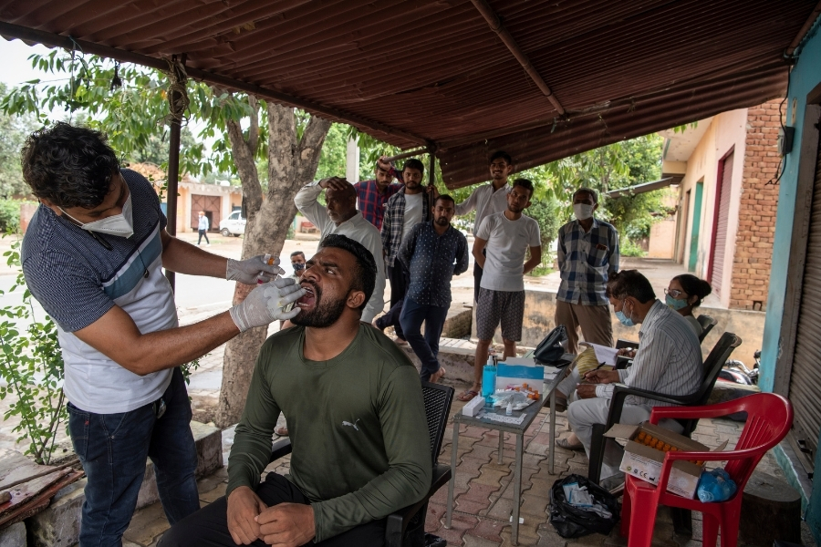 Covid-19 strategy divides India's villages, vaccine hesitancy unites them
