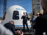 Bezos will fly aboard Blue Origin's first human trip to space