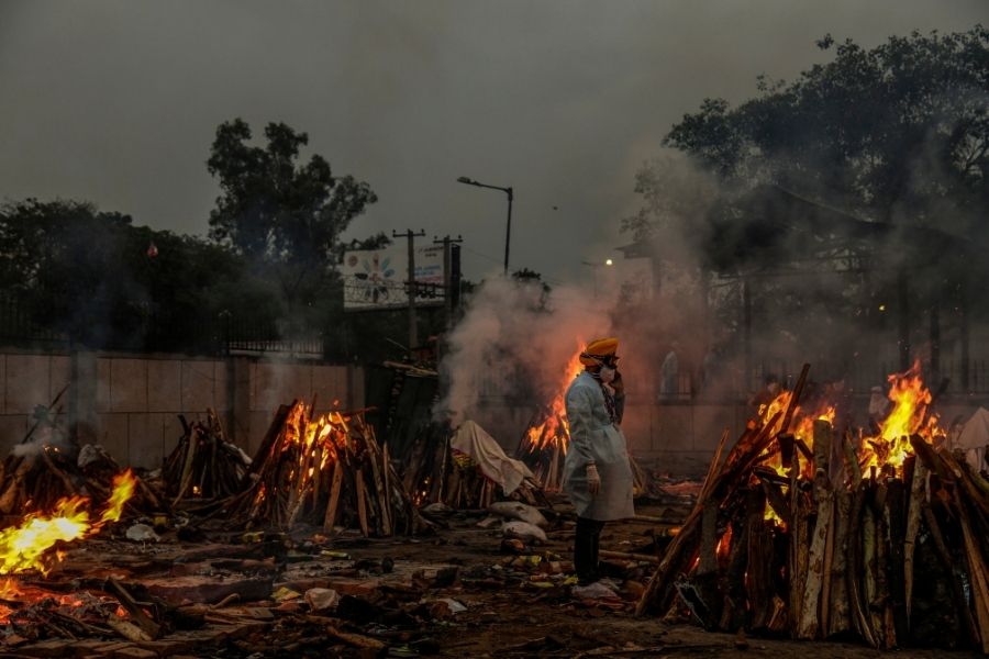 At India's funeral pyres, Covid-19 sunders the rites of grief