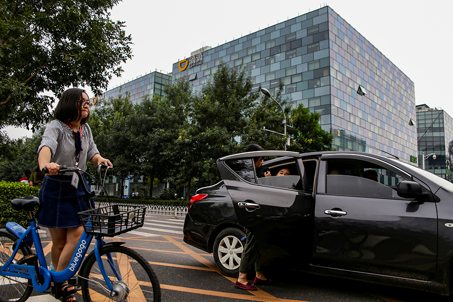 Uber is losing big money, as China cracks down on Didi
