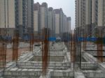 China's economy slowed late last year on real estate troubles