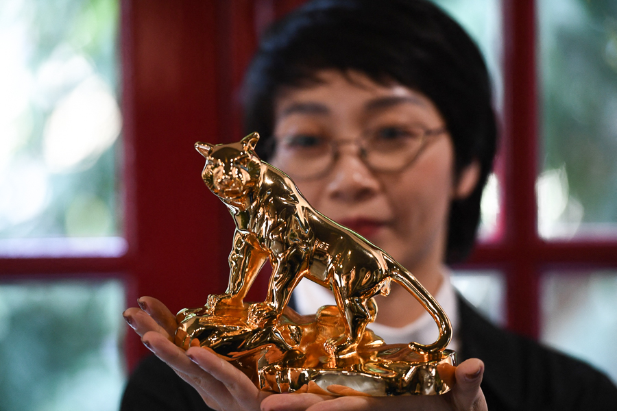 Burning bright: Vietnam splurges on gold-plated new year tiger
