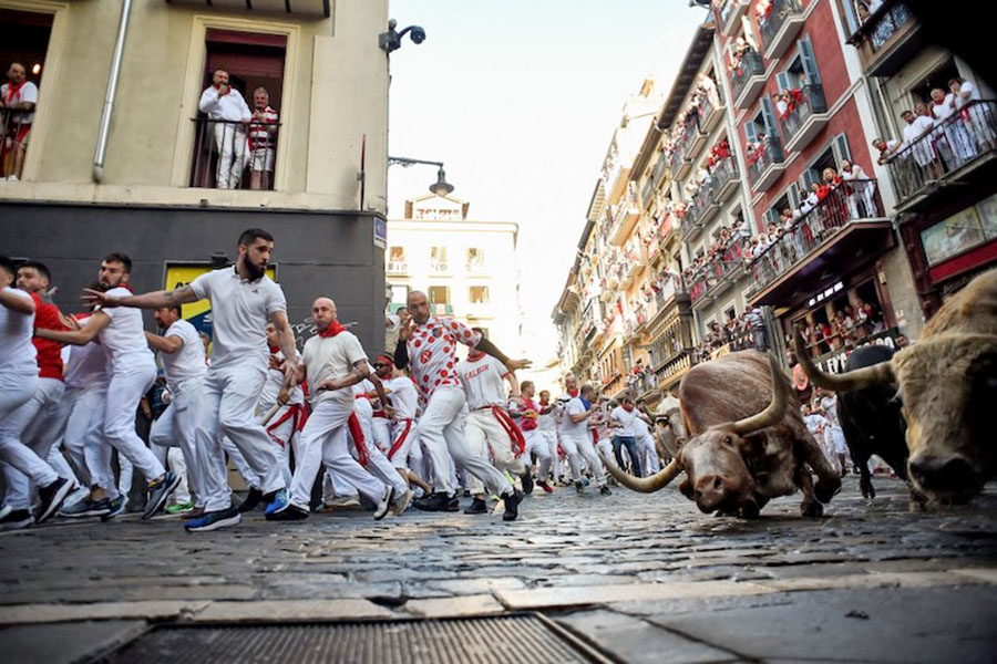 Foreigners flock back to Spain for bull-running fiesta