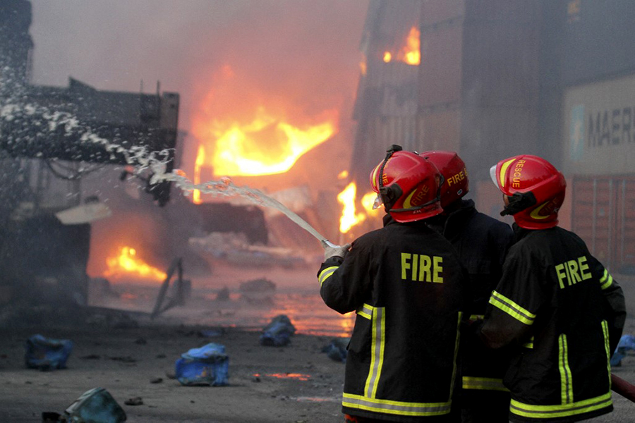 Bangladesh port depot fire kills 49, injures 300