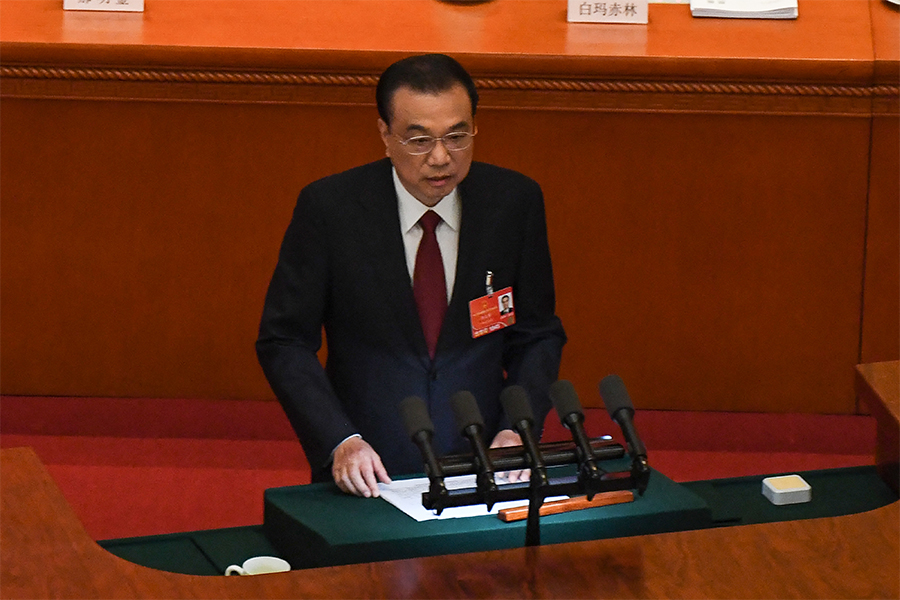 China premier issues warning on Covid-hit economy