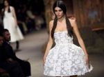Dior turns heels and corsets into 'ironic power dressing'