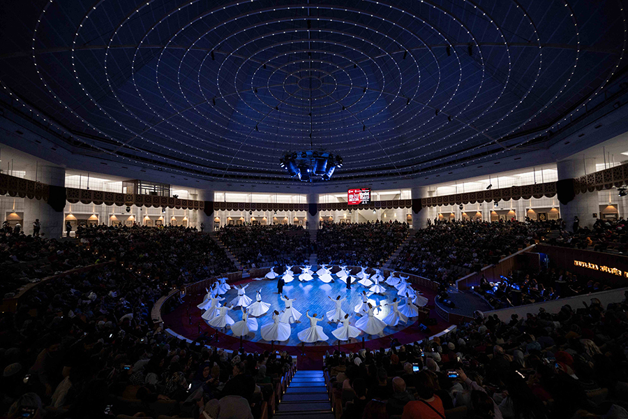 Turkey's whirling dancers celebrate mystic Rumi's tolerance
