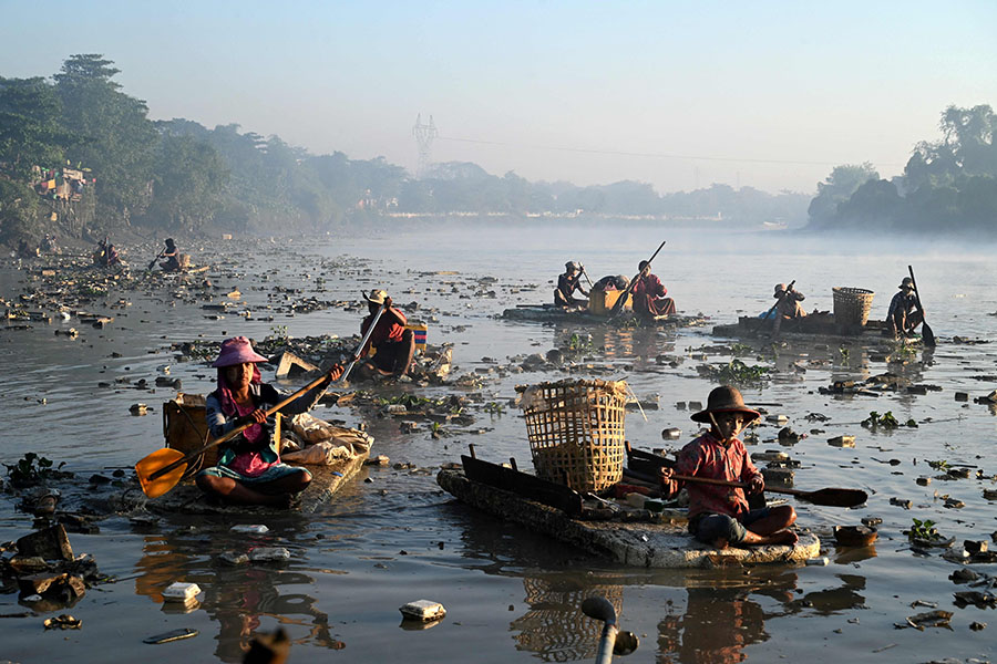 On the water with Myanmar's 'river cleaners'