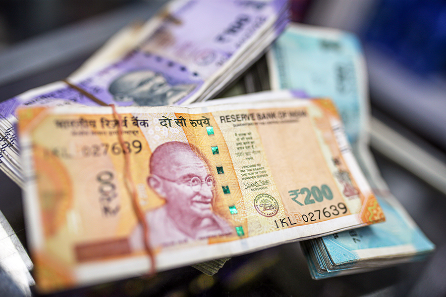 Morning Buzz: Rupee falls to weakest monthly close, Adani Green to raise Rs 12,400 crore, and more