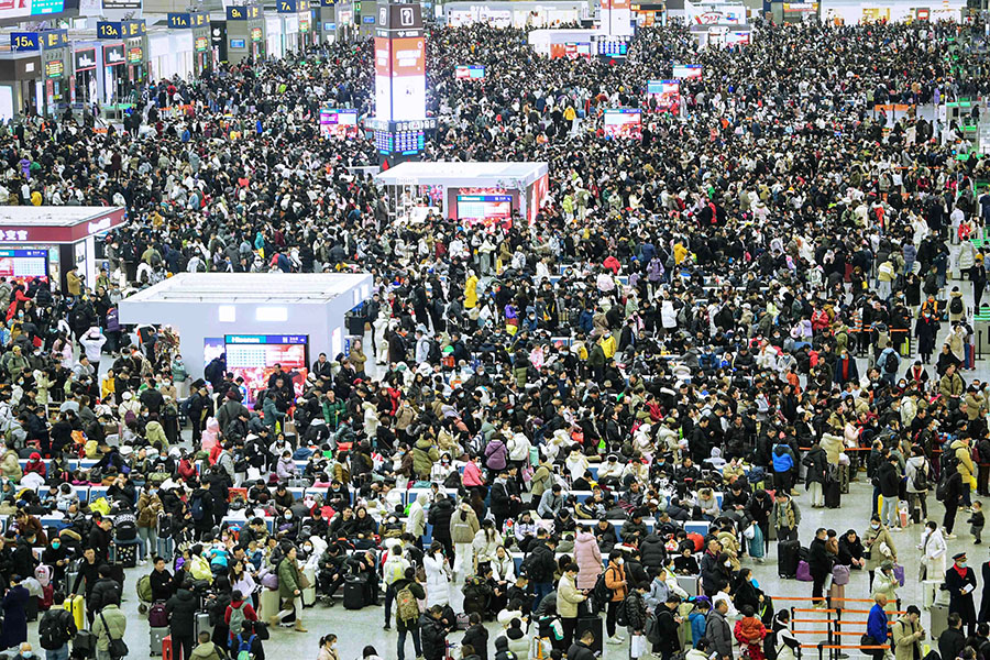 Chinese endure New Year travel rush for a taste of home
