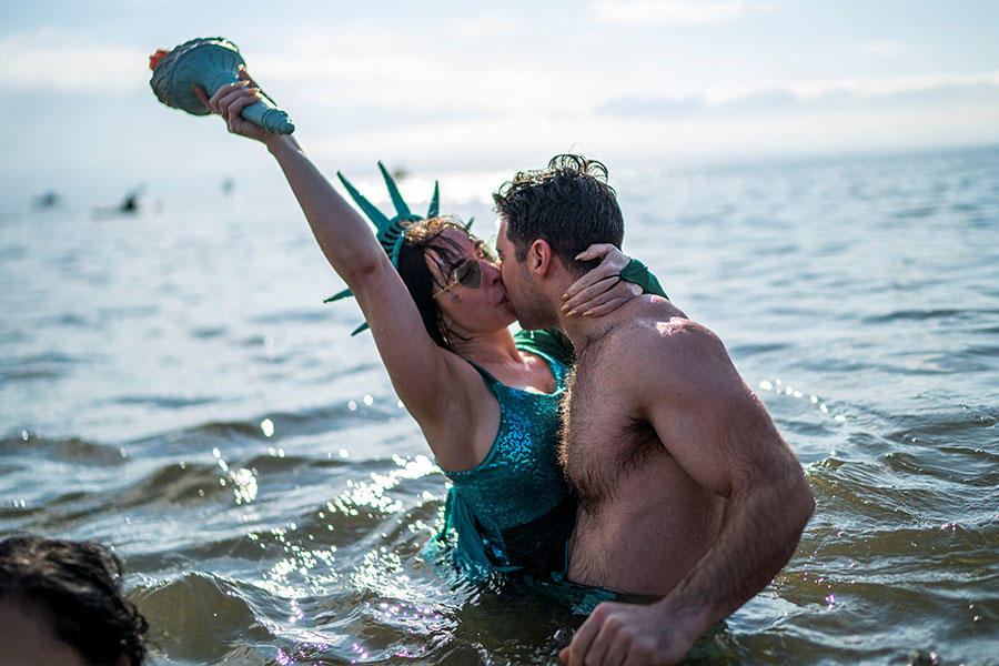 India's cosmic start to the New Year, an embrace from the Statue of Liberty: The week, in photos